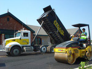 Image of truck dumping gravel