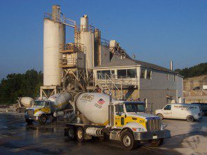 Image of cement truck getting filled