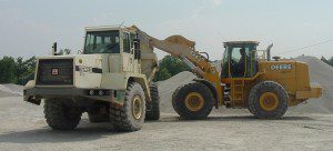 Image of truck dumping gravel